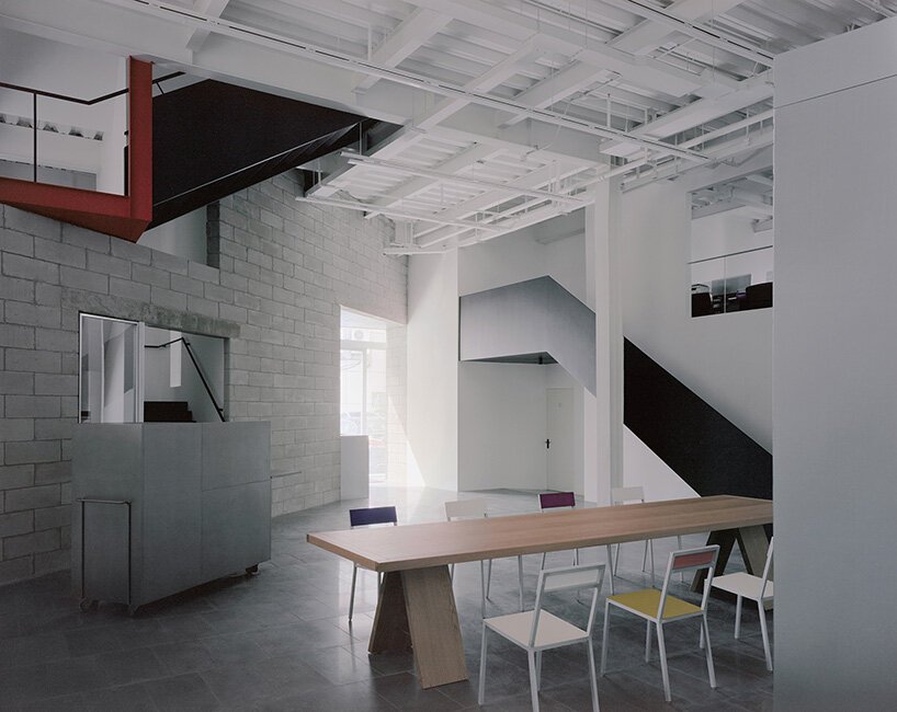 skewed meeting room bends the grid in shanghai office revamp by atelier siyu