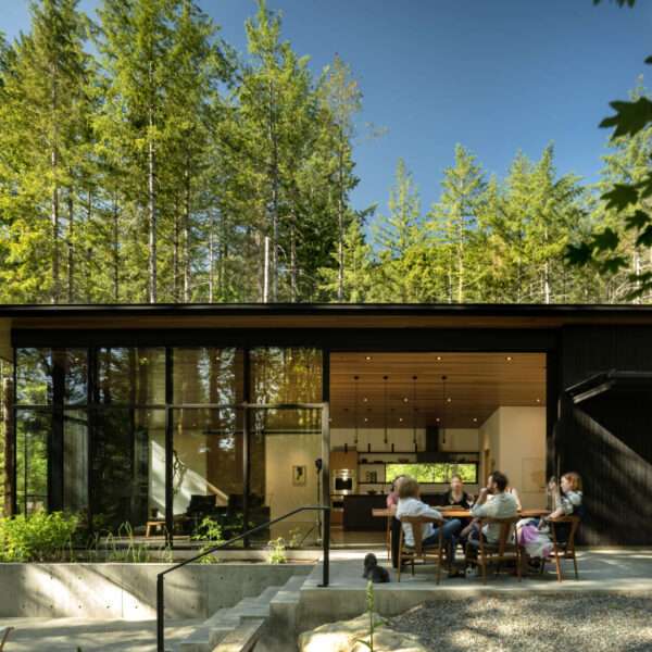  A home designed to follow the land, not alter it. Forest Pavilion preserves the contours of the Pacific Northwest forest, with minimal site impact and a rain-friendly roof that turns weather into a design feature.