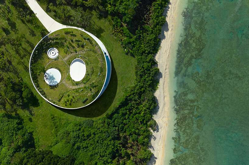 sou fujimoto's circular green-roofed villa for NOT A HOTEL opens on ishigaki island, japan