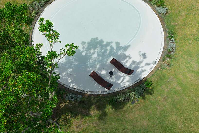sou fujimoto's circular green-roofed villa for NOT A HOTEL opens on ishigaki island, japan