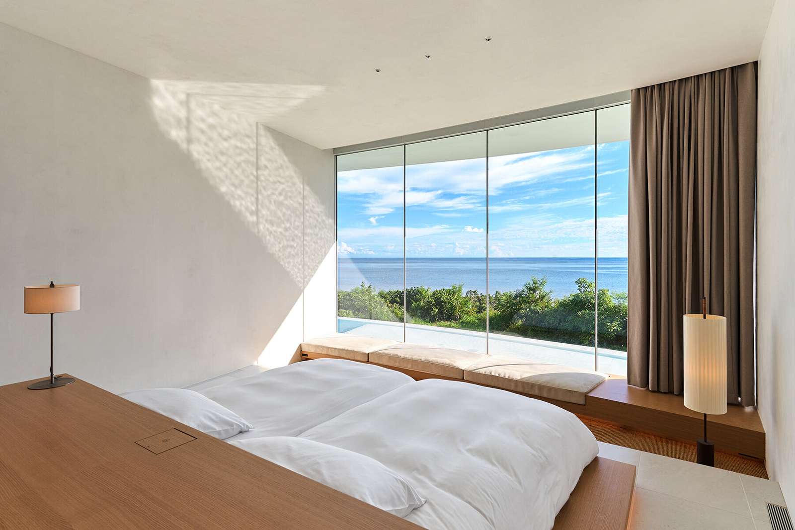 sou fujimoto's circular green-roofed villa for NOT A HOTEL opens on ishigaki island, japan
