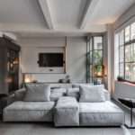 A 1930s shoe factory was converted into a contemporary apartment filled with industrial character and highly personal design details.