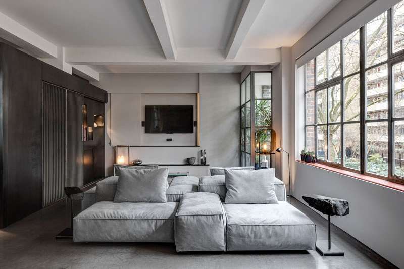 A 1930s shoe factory was converted into a contemporary apartment filled with industrial character and highly personal design details.