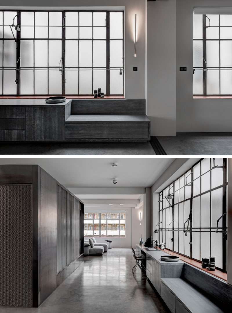 A built-in bench runs along one side of the apartment, cleverly transitioning into a desk that creates a dedicated home office. 