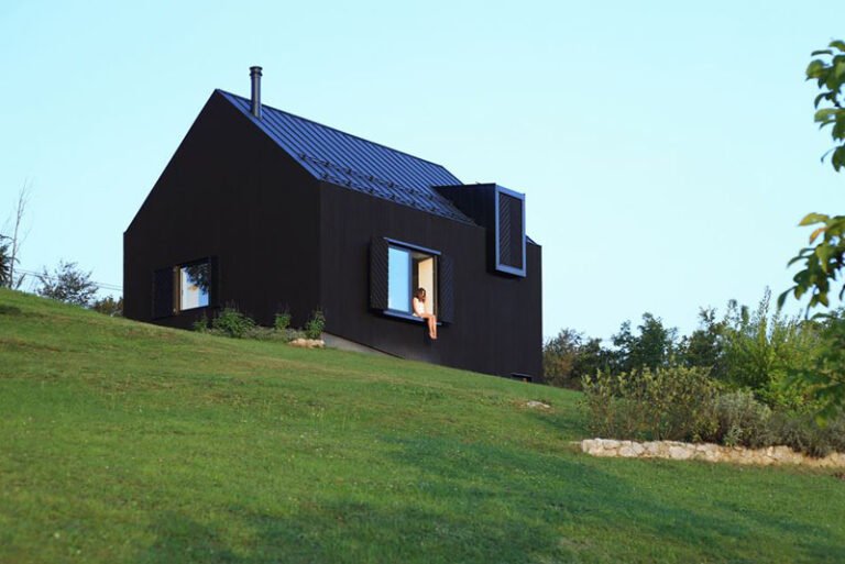 A striking little black house designed by Tomislav Soldo in the hills of Ogulin, Croatia. The blackened wood facade blends into the landscape while opening up to panoramic views of the valley and mountains.