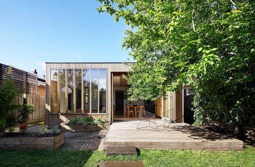 The house began as a turn-of-the-century weatherboard, with a traditional Victorian look at the front. At the rear, however, a bold new extension redefines the home. Known as Wooden Box, the addition is a simple timber structure that continues the original roofline, allowing old and new to sit side by side in harmony.