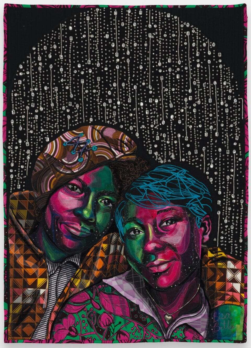 a quilted artwork by Bisa Butler showing two Black women leaning affectionately close to one another as if posing for a photograph