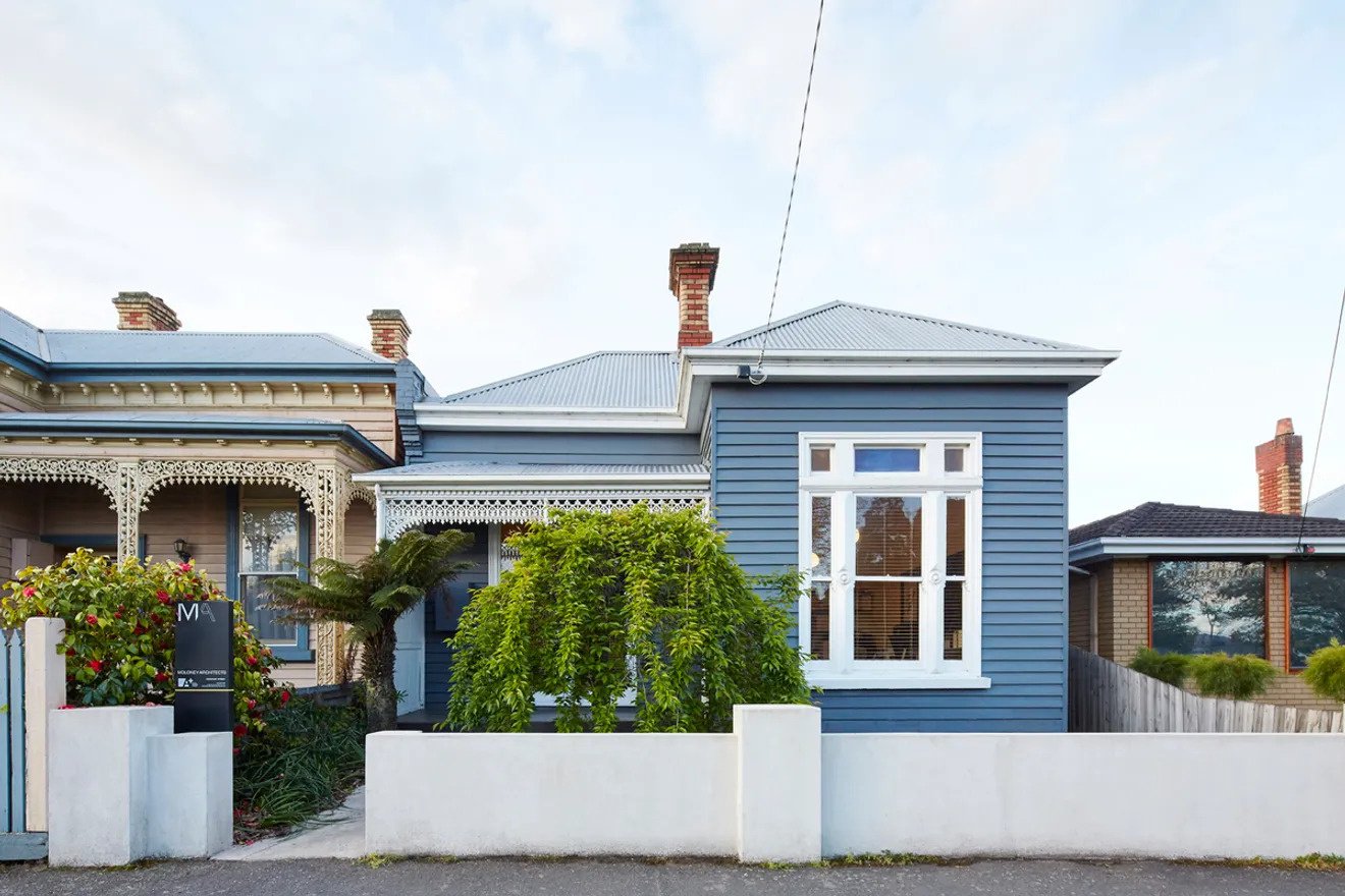 The house began as a turn-of-the-century weatherboard, with a traditional Victorian look at the front. At the rear, however, a bold new extension redefines the home. Known as Wooden Box, the addition is a simple timber structure that continues the original roofline, allowing old and new to sit side by side in harmony.