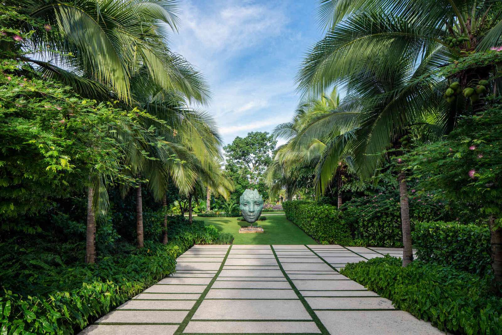 A calm Bahamian villa where coral stone, tropical gardens, and canal side views shape every room.