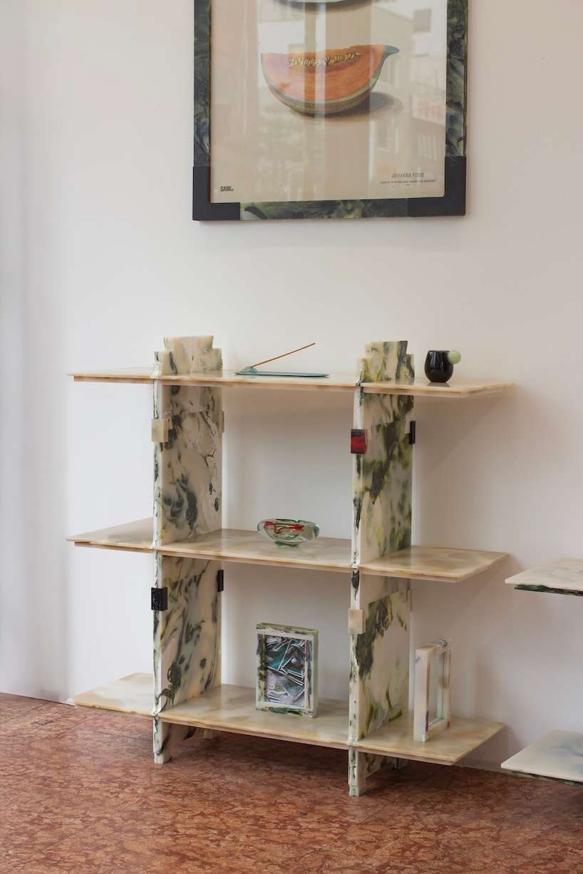 plastic marble display shelf turns upcycled materials into reconfigurable furniture