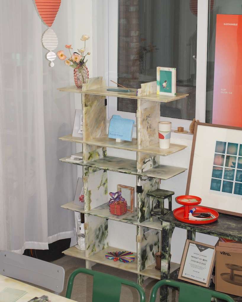 plastic marble display shelf turns upcycled materials into reconfigurable furniture