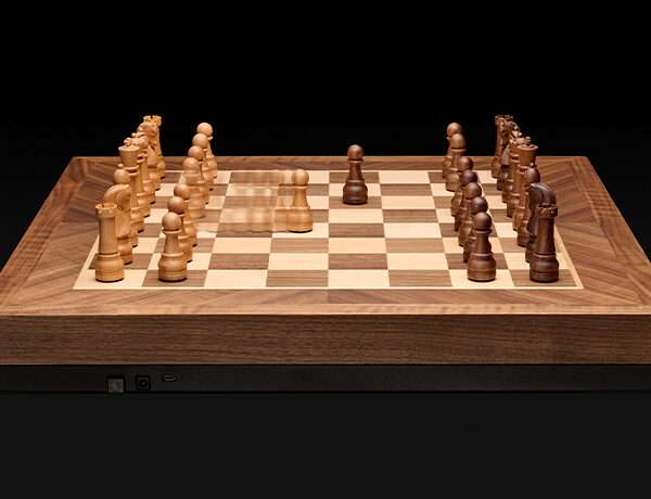 crafted in solid walnut and maple, phantom is the world’s first robotic chessboard