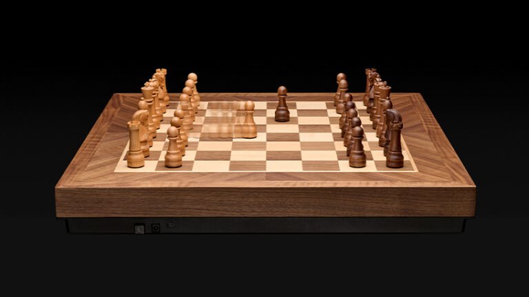 crafted in solid walnut and maple, phantom is the world’s first robotic chessboard
