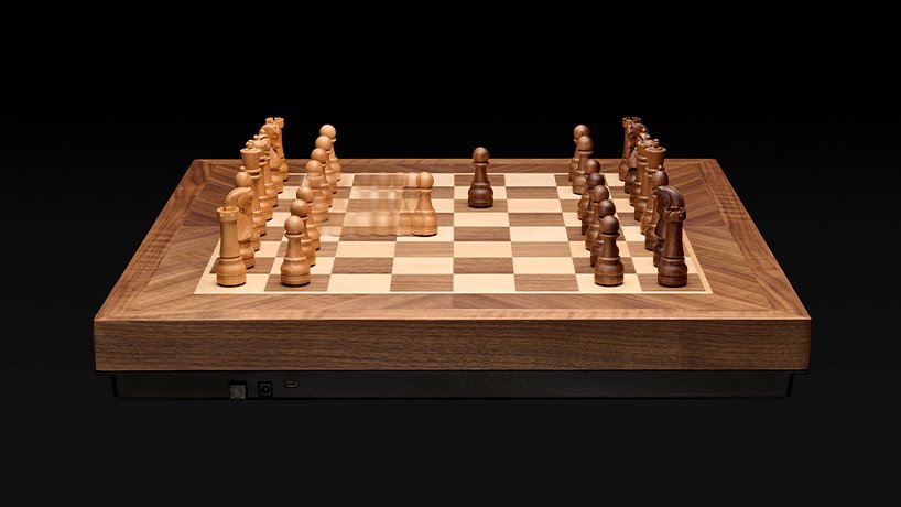 crafted in solid walnut and maple, phantom is the world’s first robotic chessboard