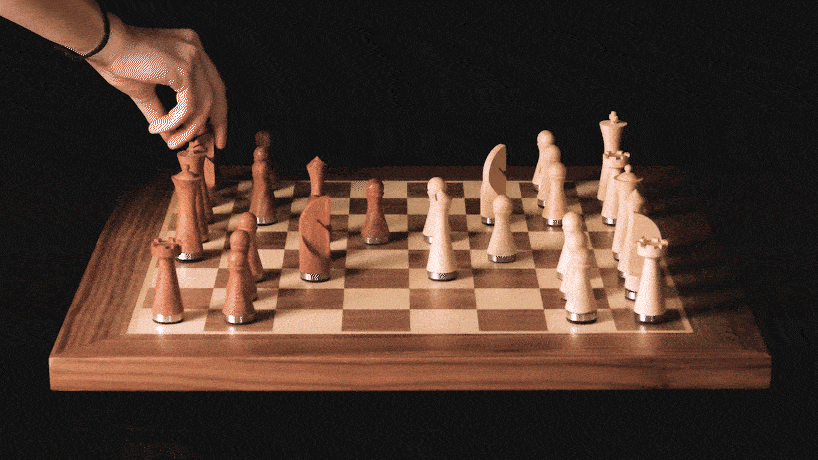 crafted in solid walnut and maple, phantom is the world’s first robotic chessboard