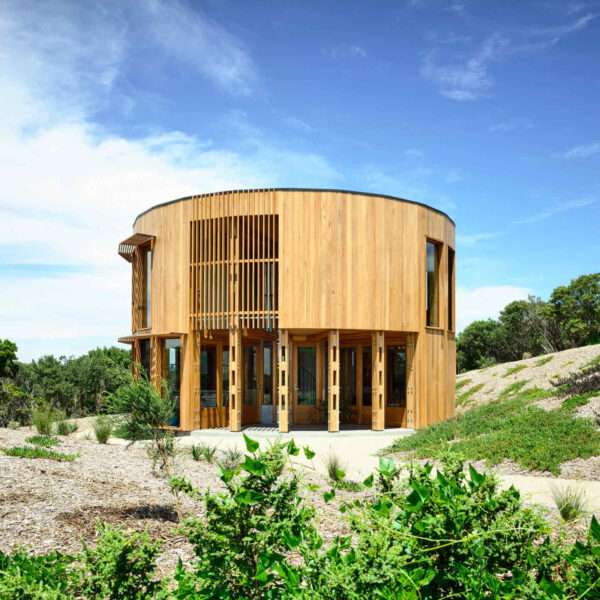 A compact circular beach house on the Mornington Peninsula designed for slow living and simplicity by the sea.
