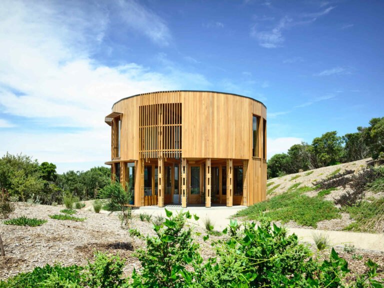 A compact circular beach house on the Mornington Peninsula designed for slow living and simplicity by the sea.