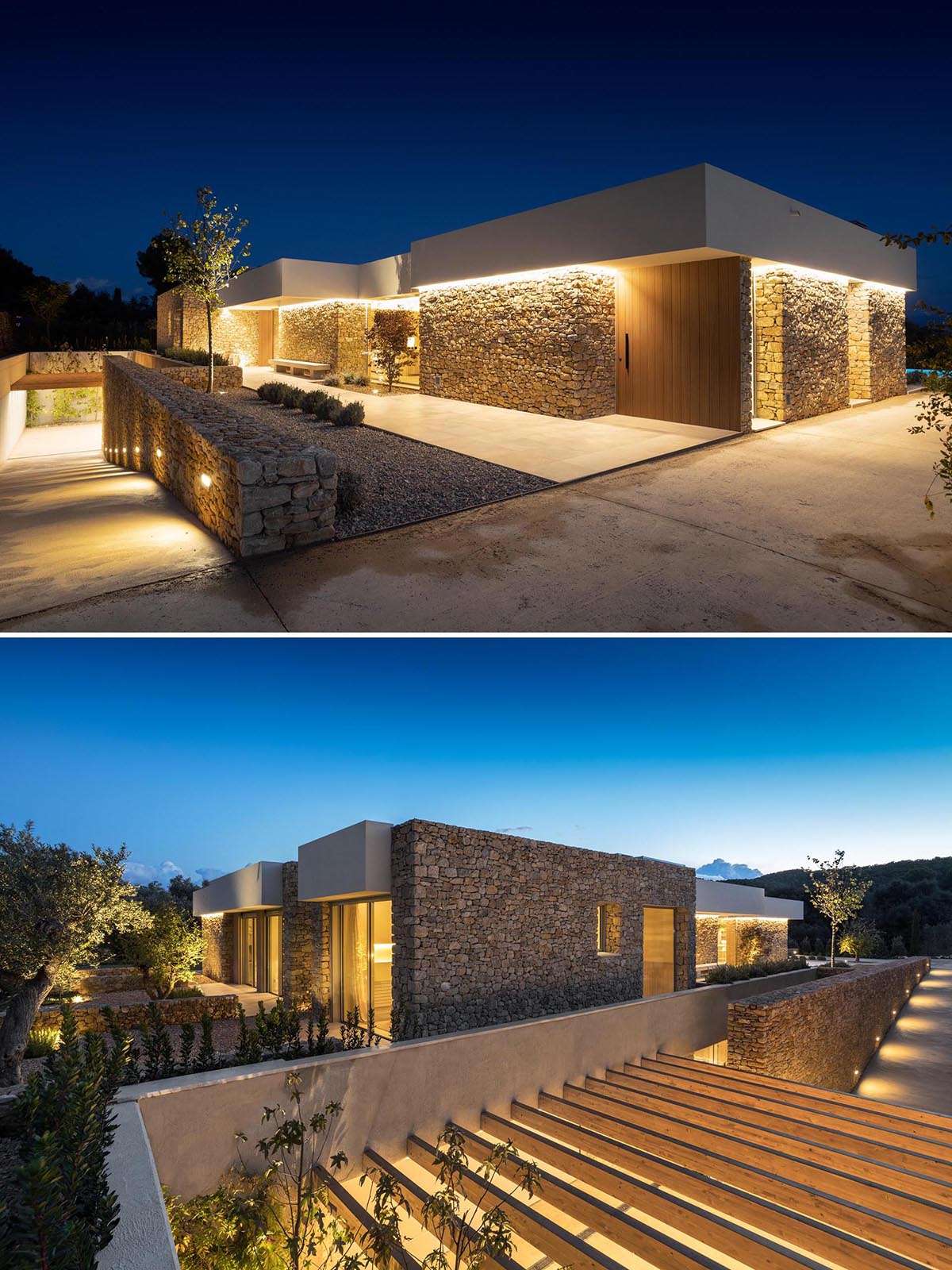 A modern house with stone walls that are highlighted by the use of both exterior and hidden lighting.