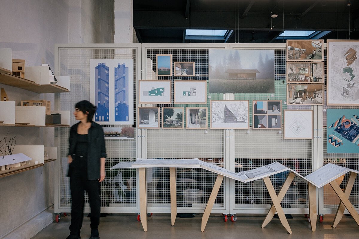 drawings and models on walls and shelves