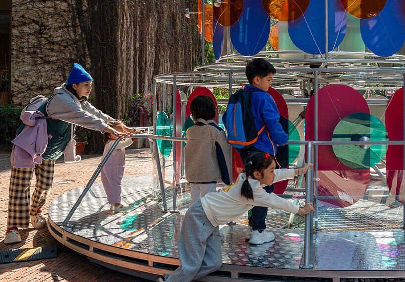 cake-like layers stack into a shared motion installation in china, bringing strangers into sync - 1