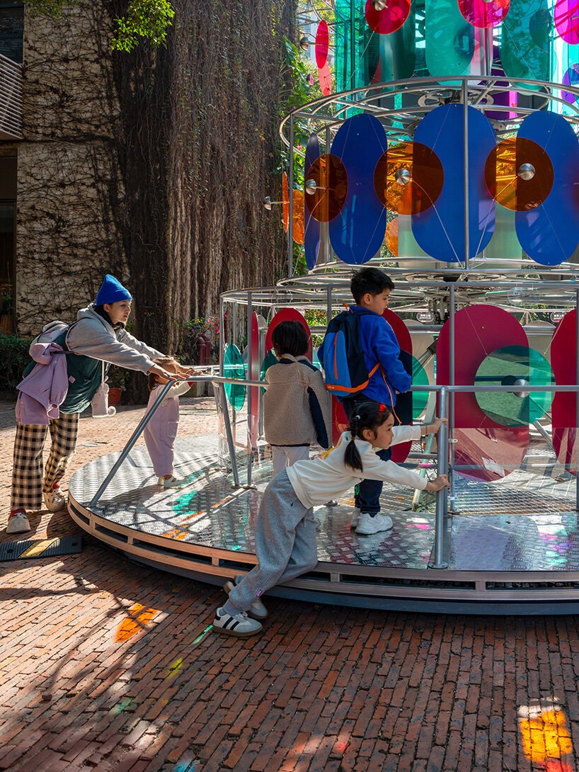 cake-like layers stack into a shared motion installation in china, bringing strangers into sync - 1