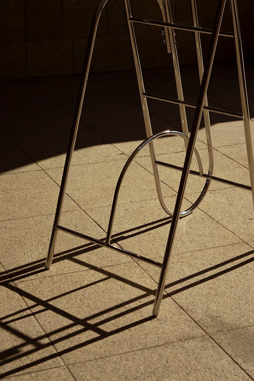 sculptural steel ladder imitates the flowing geometries of brass musical instruments - 10
