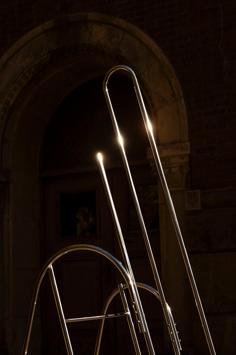 sculptural steel ladder imitates the flowing geometries of brass musical instruments - 11
