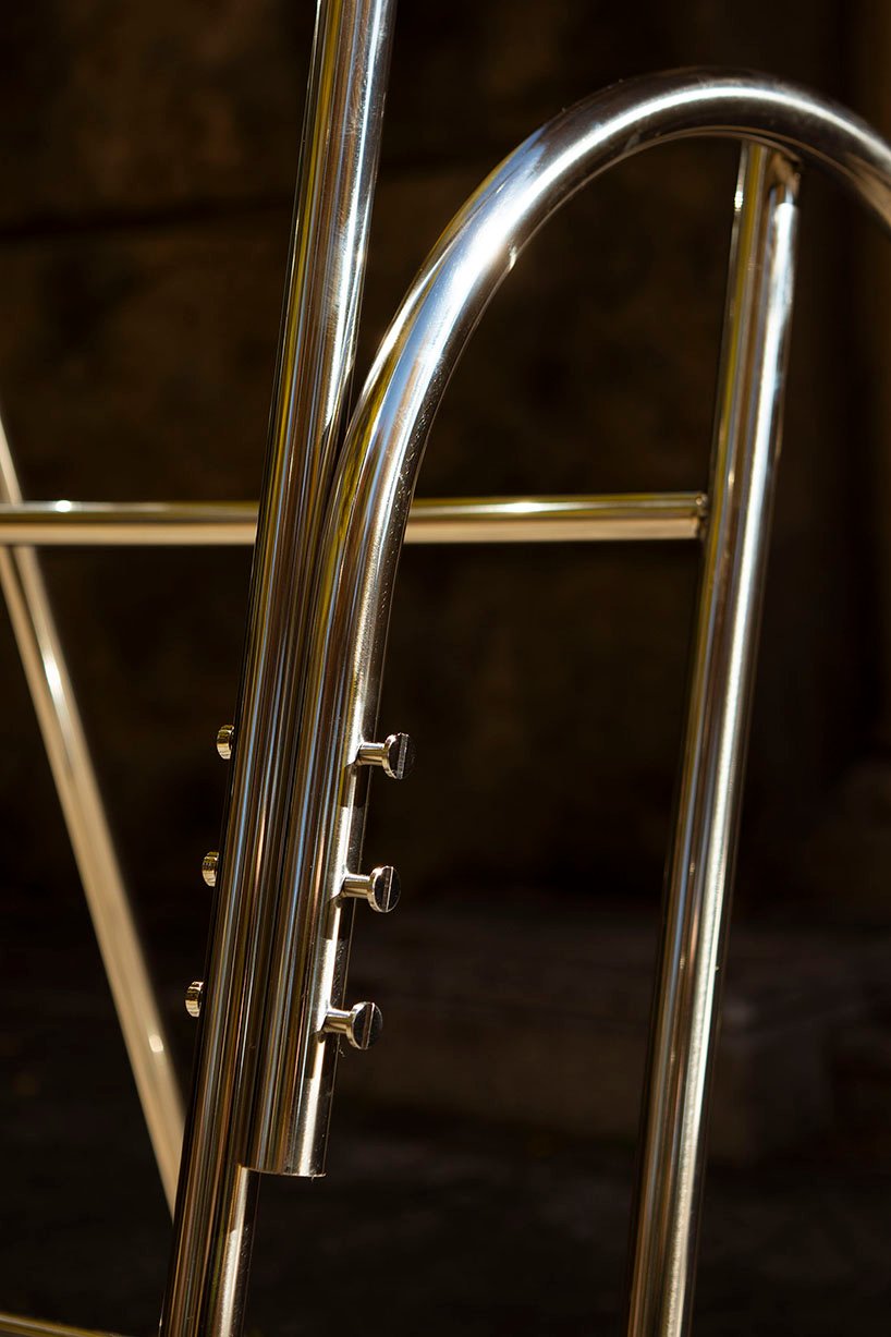 sculptural steel ladder imitates the flowing geometries of brass musical instruments - 12