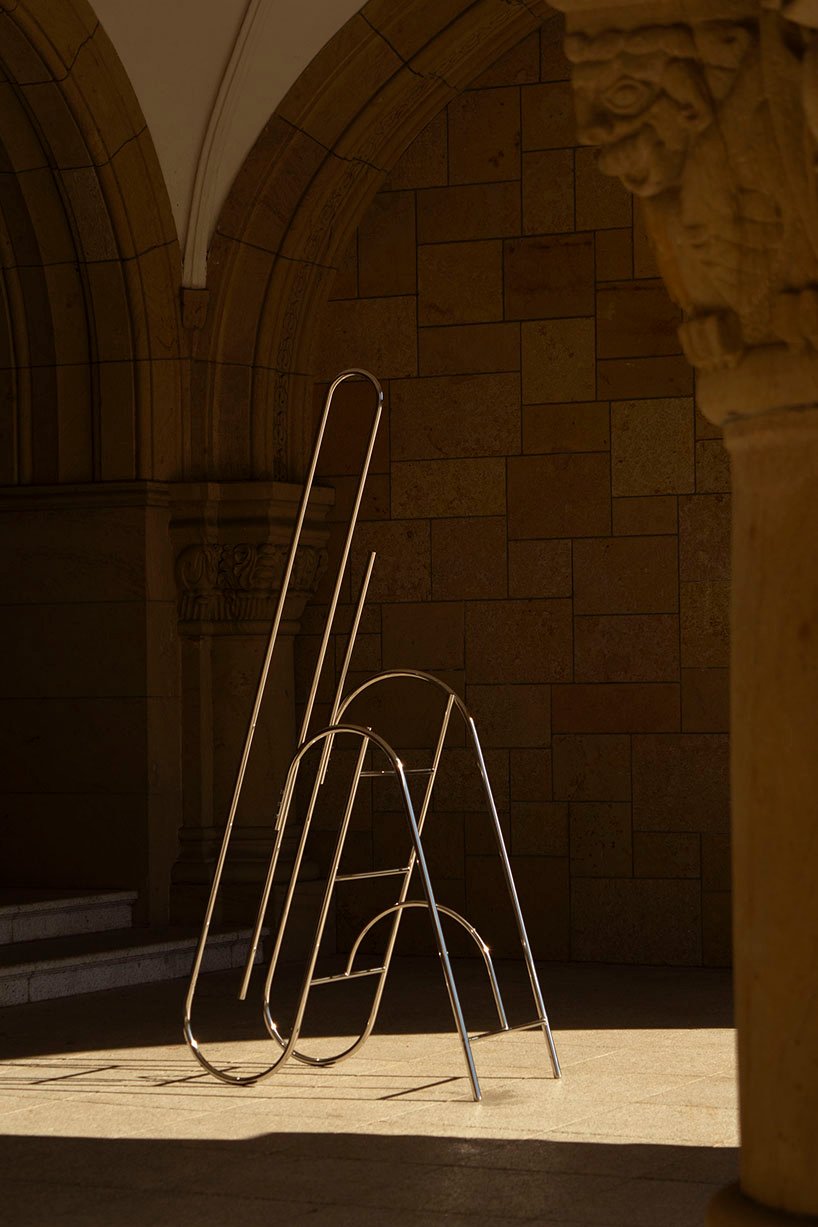 sculptural steel ladder imitates the flowing geometries of brass musical instruments - 4