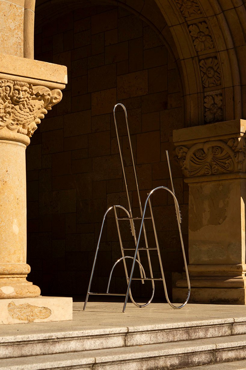 sculptural steel ladder imitates the flowing geometries of brass musical instruments - 5