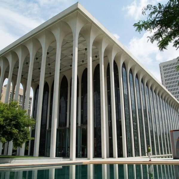 Minoru Yamasaki's Northwestern National Life Building in Minneapolis reflected in one of its paired ground-level pools