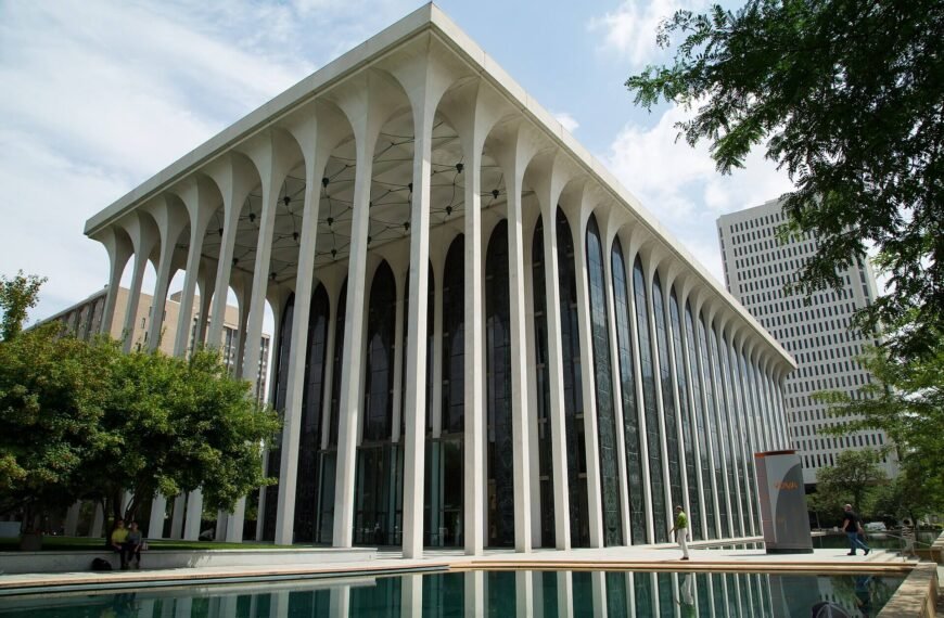 Minoru Yamasaki's Northwestern National Life Building in Minneapolis reflected in one of its paired ground-level pools
