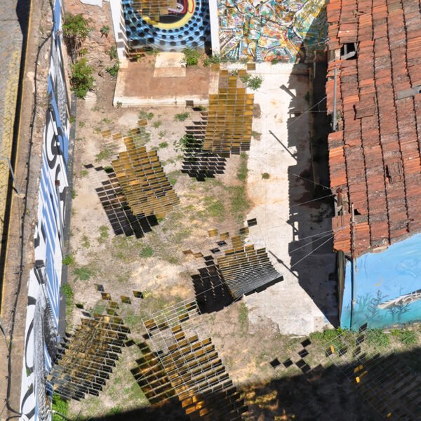 kinetic mirrored installation in portugal by moradavaga evokes a shoal of golden fish - 1