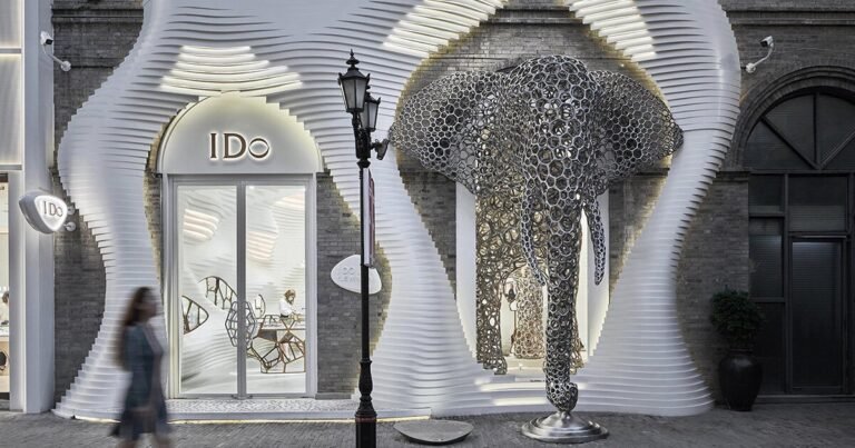 life-size lattice 3D-printed elephant pops out of antistatics’ retail retailer façade in china