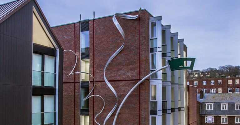 alex chinneck unveils 25-meter-high spiraling sculpture in brighton, uk