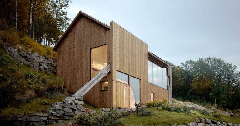 a slanted beam helps this fjord-side cabin in western norway