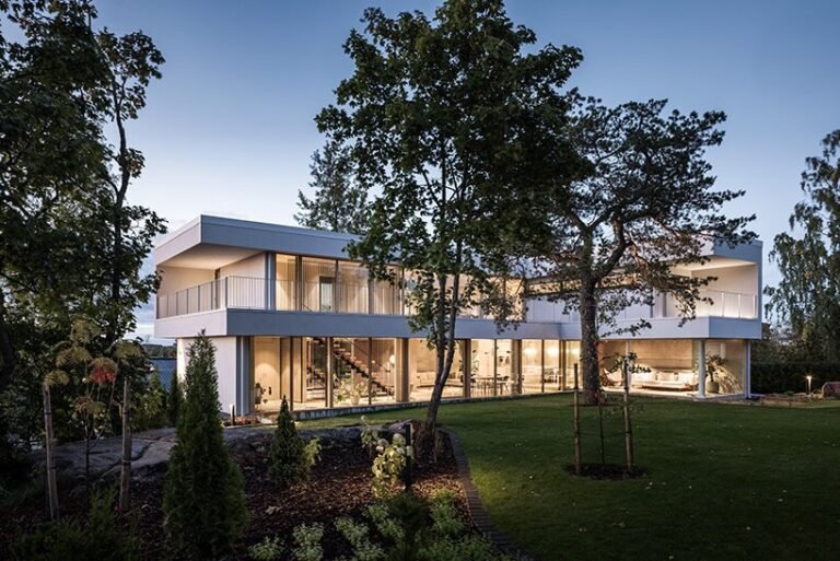 geometric residence by avanto architects wraps round sheltered courtyard in helsinki