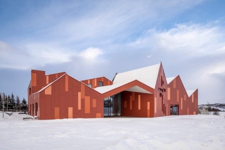 the salvation military headquarters in reykjavik stands out with its varied shades of crimson