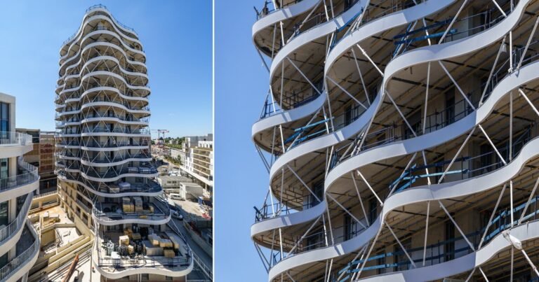 a housing tower with stacked and staggered undulating terraces takes form in montpellier