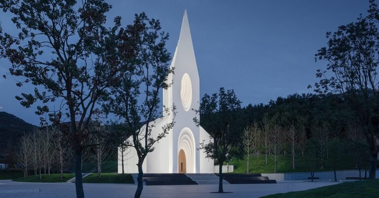 RSAA encloses chamber church with illuminated layered silhouettes in china