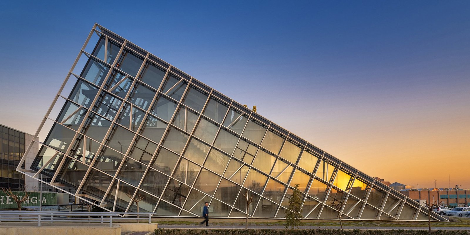 this new workplace and incubator constructing in tehran rises dramatically from the bottom