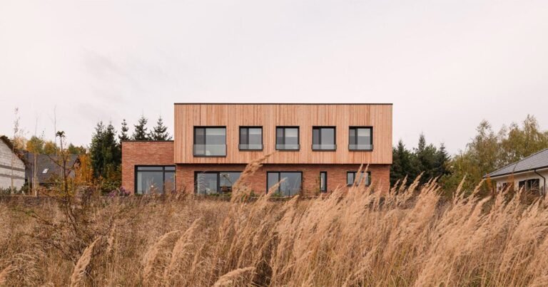 warm-toned wooden and brick façades full household dwelling in poland by studio GAB