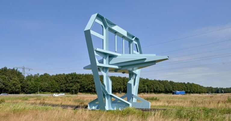 studio frank havermans erects a blue, business impressed gate within the netherlands