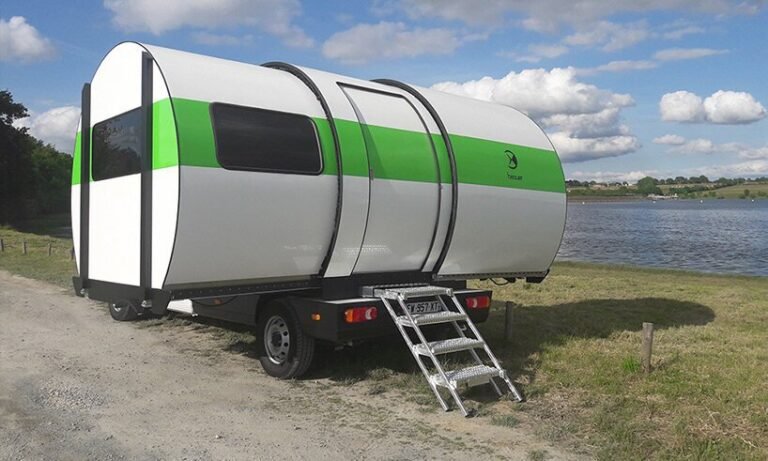 the beauer 3XC camper is a tiny can-shaped trailer that expands to triple its size