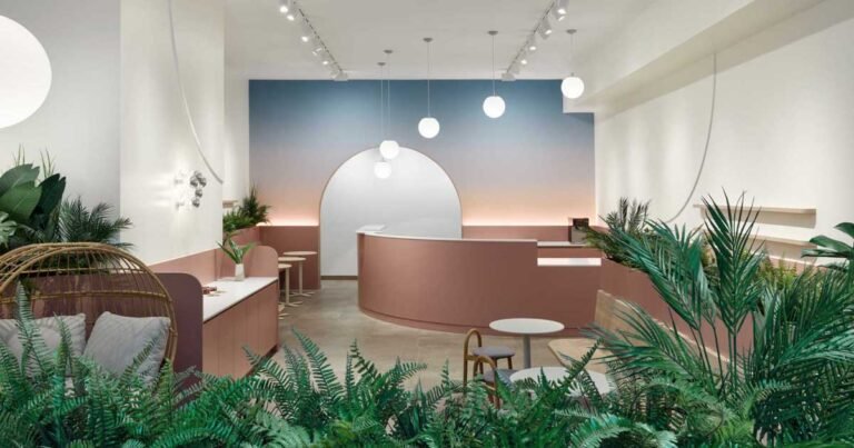 Soft Colors Were Used To Design A Relaxed Atmosphere For This Cafe