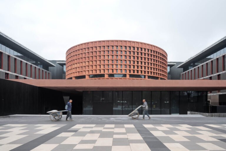 Neri&Hu extends the Qujiang Museum of Fine Arts with a red travertine facade