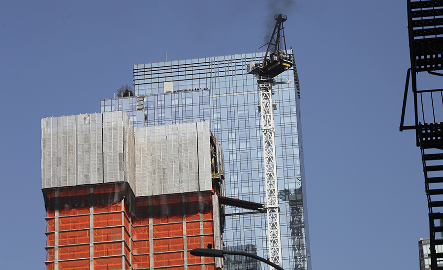 Loaded Boom of Burning Tower Crane Collapses in Manhattan, Injuring Six