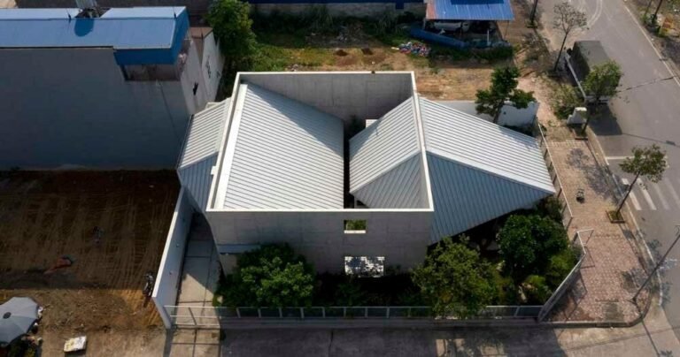 intersecting geometries form AHL architects’ DHY house and café in vietnam