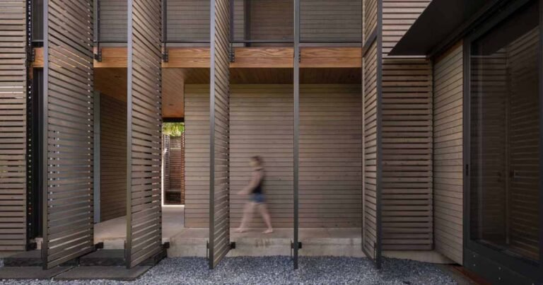 Operable Screens Cover The Exterior Of This Hawaiian Home