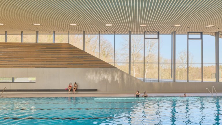 Behnisch Arkitekten's Schwaketenbad Aquatic Center Puts a Pool-Packed Program Under Three Distinct Roofs